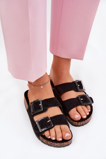 Zapatillas de mujer con hebillas sobre suela de corcho color negro con corazones