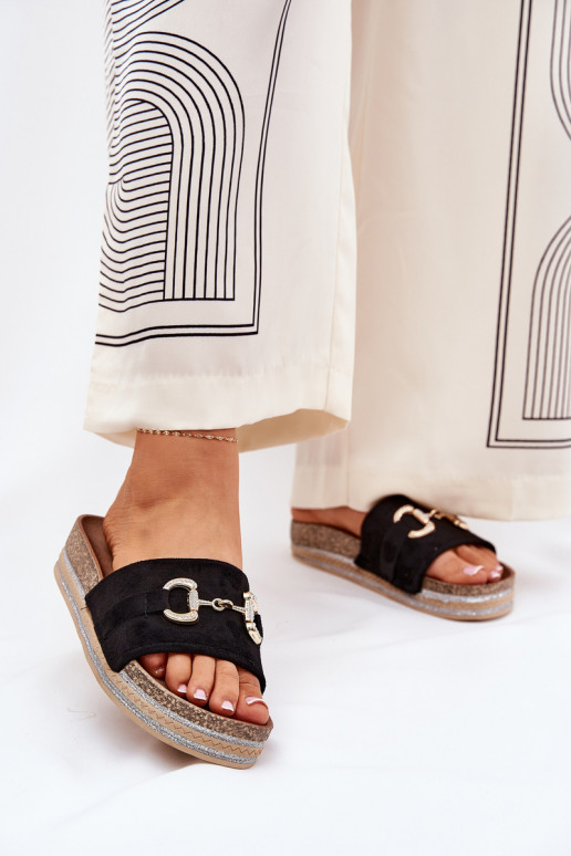 zapatillas de mujer con una plataforma con detalles dorados y brillo de color negro Morisela