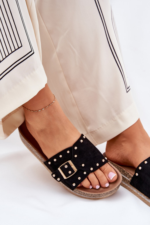 zapatillas de mujer con una plataforma con hebillas y sementales de color negro Nusithia