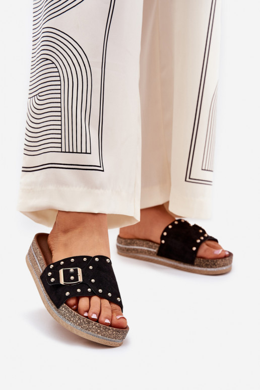 zapatillas de mujer con una plataforma con hebillas y sementales de color negro Nusithia