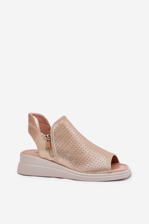 Sandalias de mujer en una cuña color dorado Mevinette