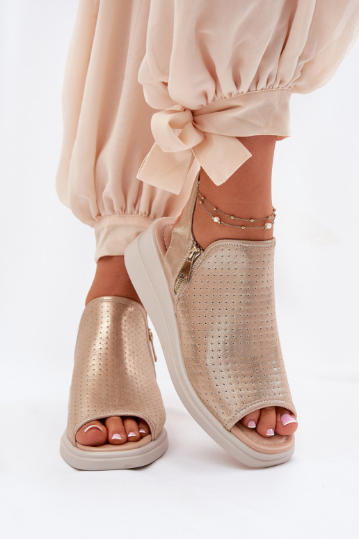 Sandalias de mujer en una cuña color dorado Mevinette