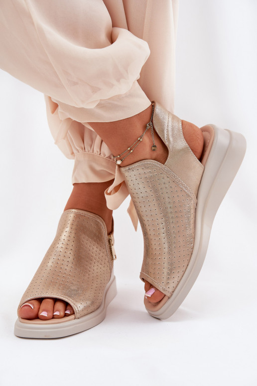 Sandalias de mujer en una cuña color dorado Mevinette