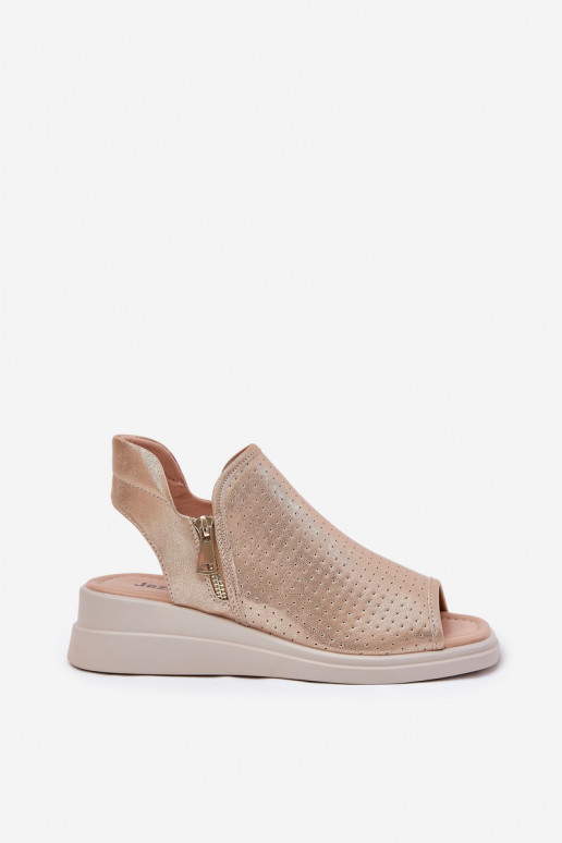 Sandalias de mujer en una cuña color dorado Mevinette