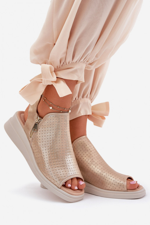 Sandalias de mujer en una cuña color dorado Mevinette