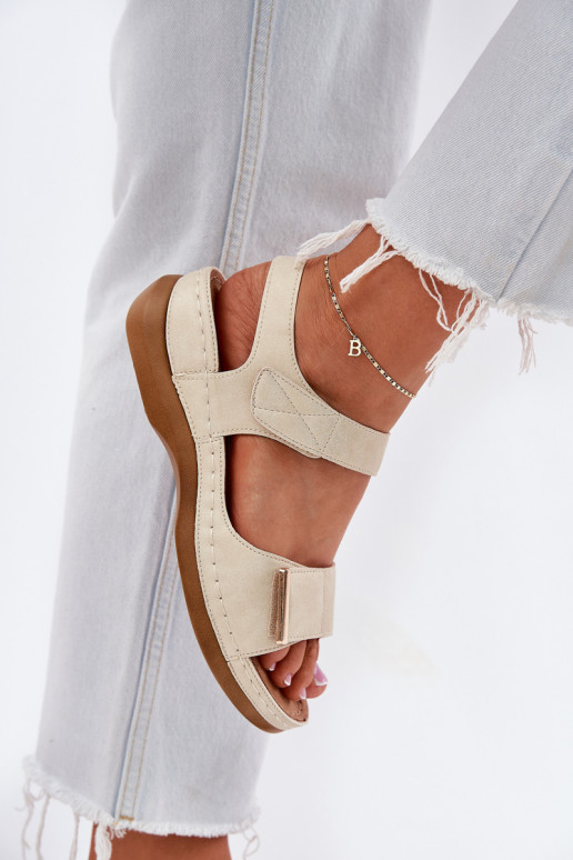 Sandalias cómodas de mujer. con sujetadores adhesivos color dorado Iphiope