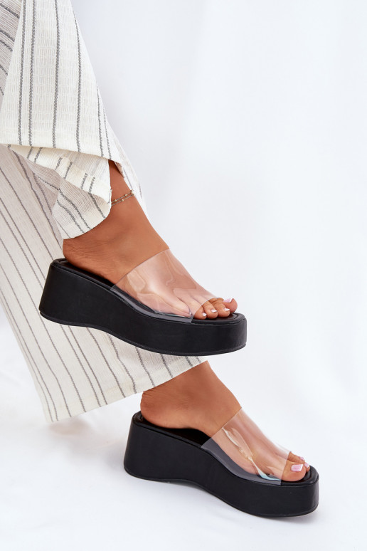 zapatillas de mujer Z Transparentnym Tirasem en una cuña de color negro Meltiana