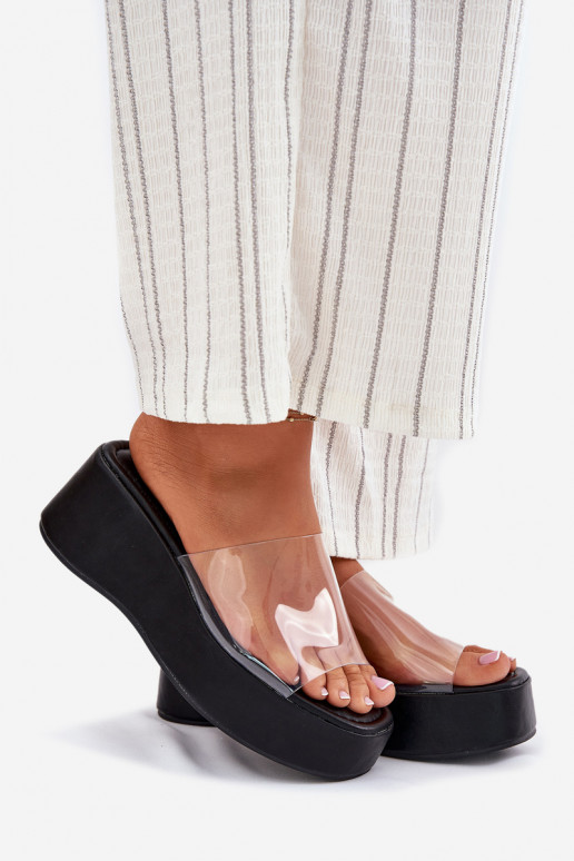 zapatillas de mujer Z Transparentnym Tirasem en una cuña de color negro Meltiana