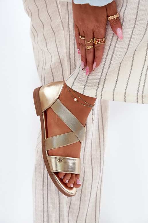 Sandalias planas para mujer. Z Elastycznymi Paskami color dorado Tiene querinea Sandalias planas para mujer. Z Elastycznymi Paskami color dorado Tiene querinea
