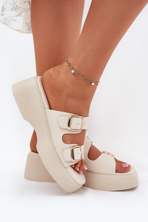 zapatillas de mujer en una cuña y plataforma con hebillas color marfil Nitarelia