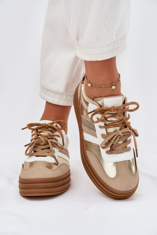 Zapatillas modelo zapatos. Femenino con una plataforma Z PodAójnym atándosem con estampados de piel de leopardo color dorado Nit