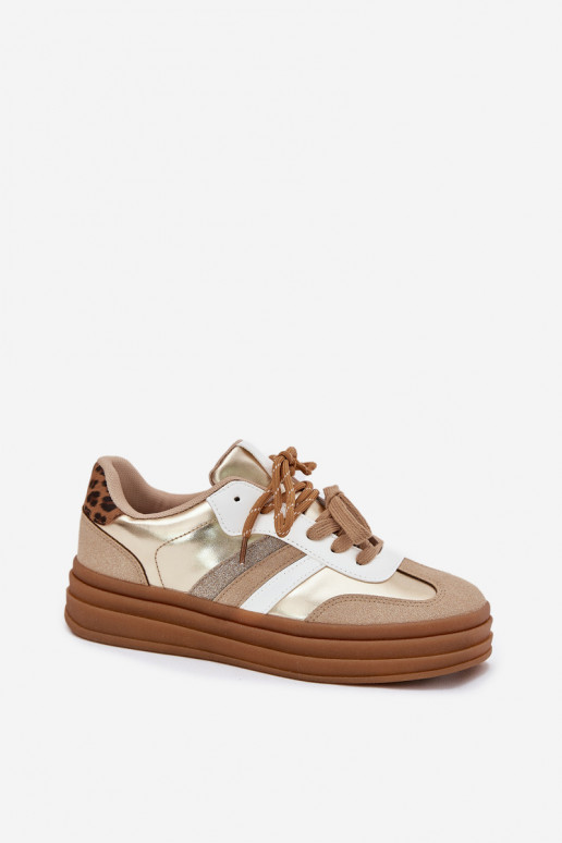 Zapatillas modelo zapatos. Femenino con una plataforma Z PodAójnym atándosem con estampados de piel de leopardo color dorado Nit