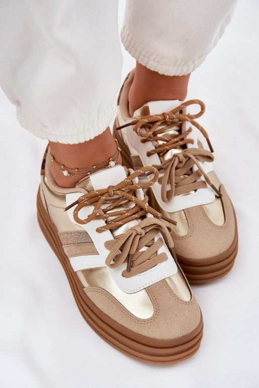 Zapatillas modelo zapatos. Femenino con una plataforma Z PodAójnym atándosem con estampados de piel de leopardo color dorado Nit