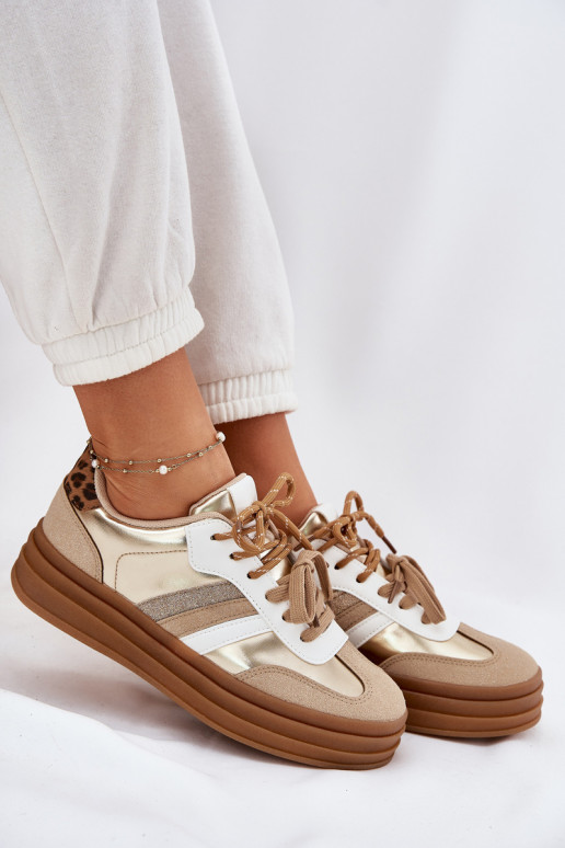 Zapatillas modelo zapatos. Femenino con una plataforma Z PodAójnym atándosem con estampados de piel de leopardo color dorado Nit