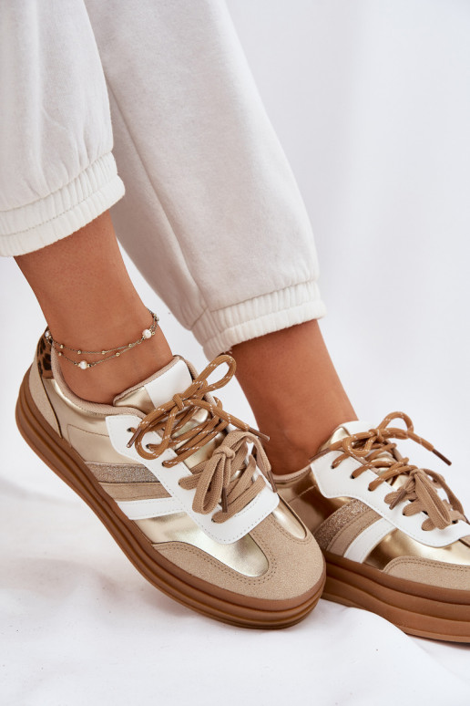 Zapatillas modelo zapatos. Femenino con una plataforma Z PodAójnym atándosem con estampados de piel de leopardo color dorado Nit