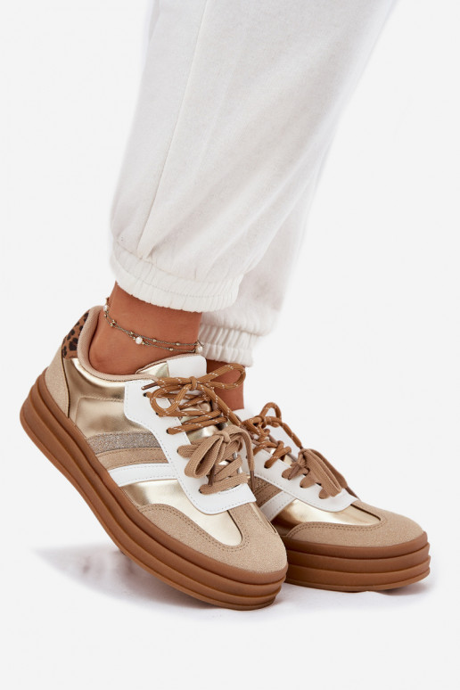 Zapatillas modelo zapatos. Femenino con una plataforma Z PodAójnym atándosem con estampados de piel de leopardo color dorado Nit