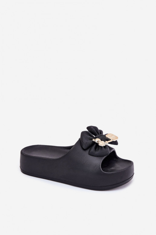 zapatillas de mujer Zapatillas ligeras con una plataforma con cintas I Broszką de color negro Tiene querlize