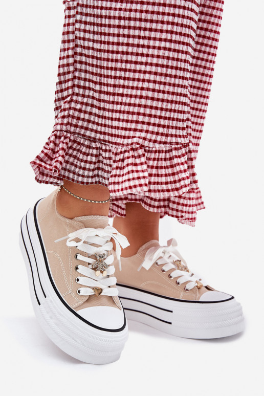 Zapatos de ocio con una plataforma Ze color doradomi Przypinkami beige Fiorina