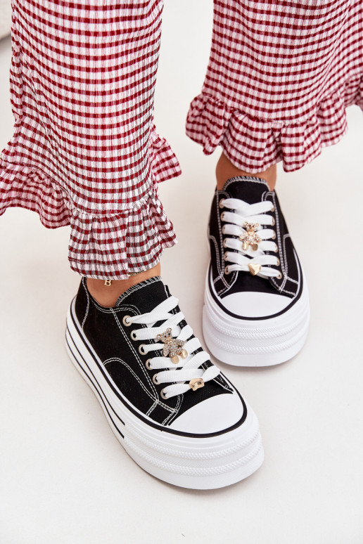 Zapatos de ocio con una plataforma Ze color doradomi Przypinkami de color negro Fiorina