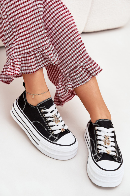 Zapatos de ocio con una plataforma Ze color doradomi Przypinkami de color negro Fiorina