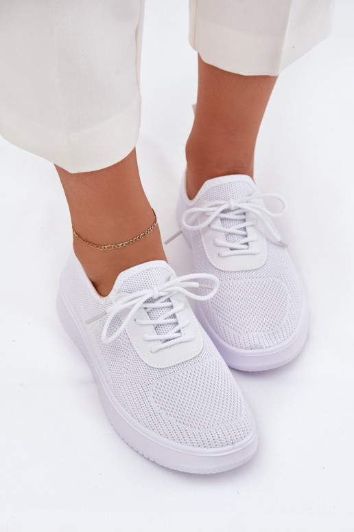  Un modelo convincente zapatillas con una plataforma Femenino el color blanco Kalyra