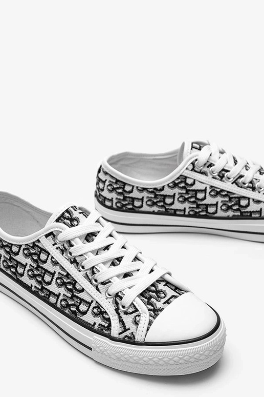 Zapatos de mujer en blanco y negro,... Zapatos de mujer en blanco y negro,...