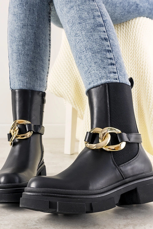 Botines negros con cadena Trinity