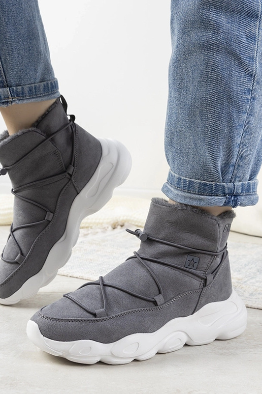 Botas de invierno grises y elegantes...