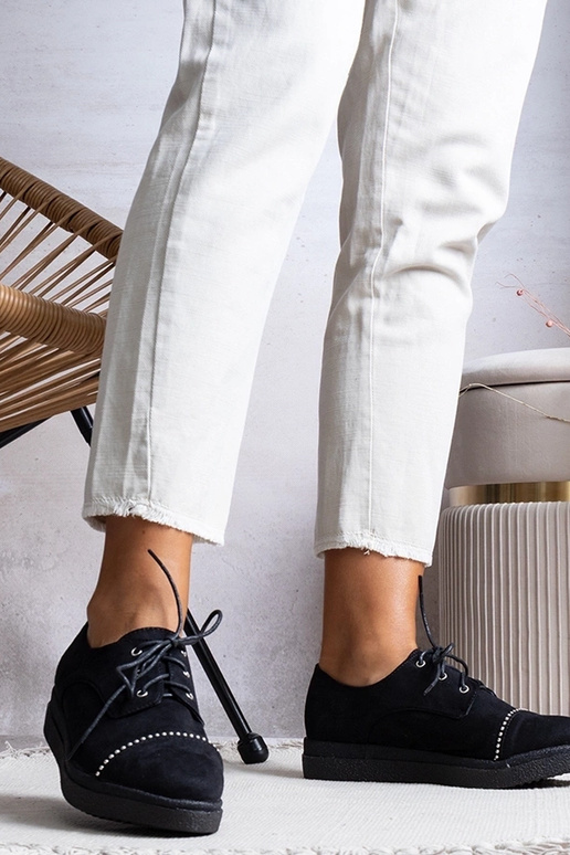 Botas negras de media caña para mujer...