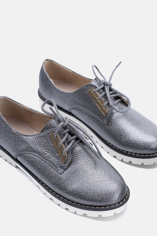 Zapatos infantiles grises brillantes...