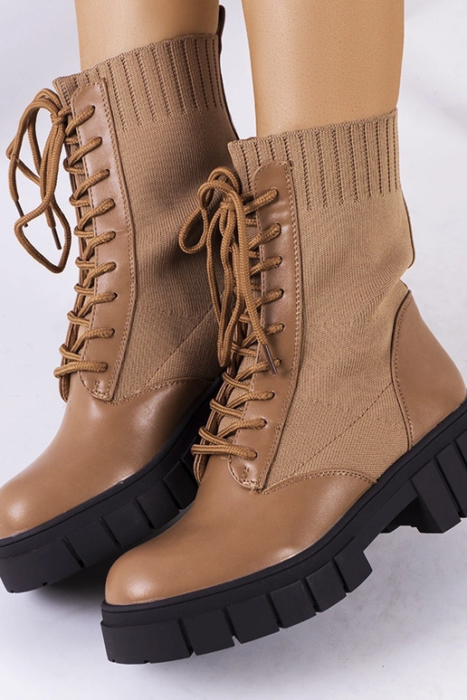 Botines marrones con caña elástica,... Botines marrones con caña elástica,...