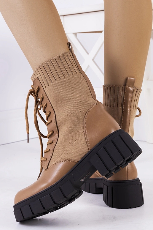 Botines marrones con caña elástica,... Botines marrones con caña elástica,...