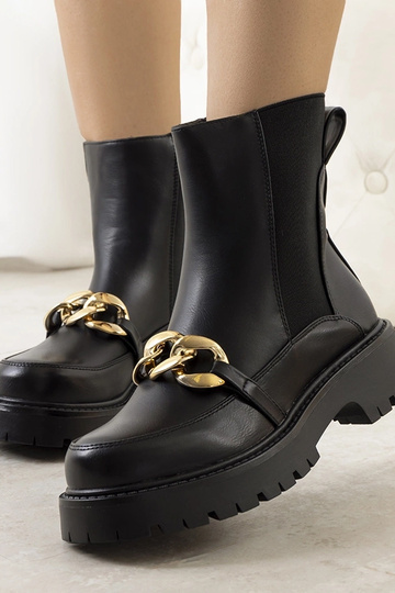 Botines negros con suela alta Pesa