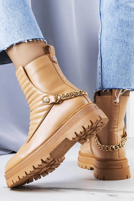 Botines beige aislantes con cadena...