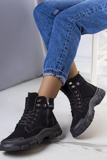 Botas negras aisladas de...