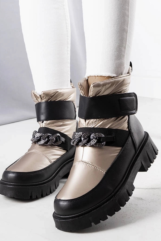 Botas de nieve con cadena dorada de...