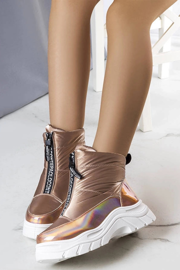 Botas de invierno doradas...