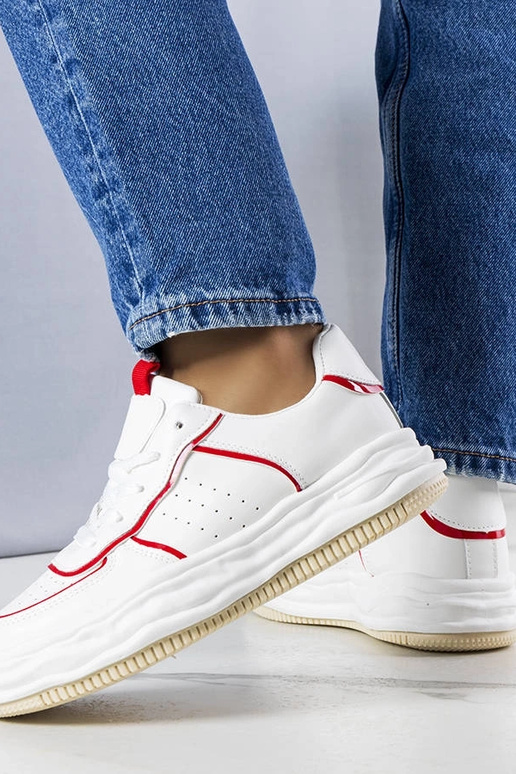 Zapatillas blancas con inserciones...