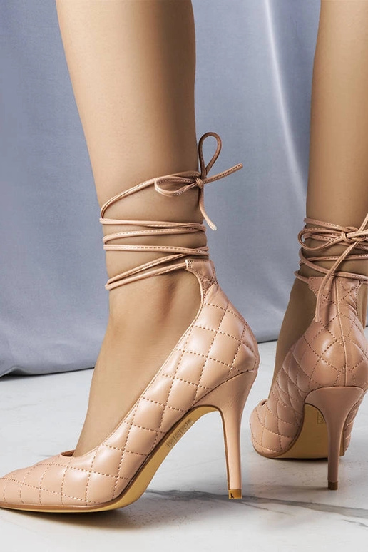 Tacones acolchados con cordones en...