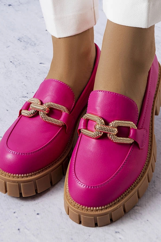 Zapatos rosados con decoración...