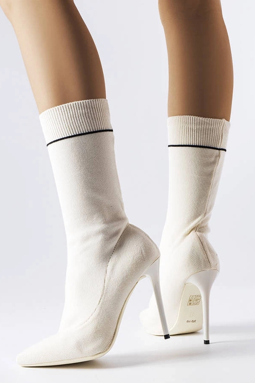 Botas blancas con tacón alto de...