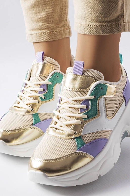 Zapatillas blancas y doradas para...