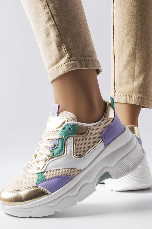 Zapatillas blancas y doradas para...