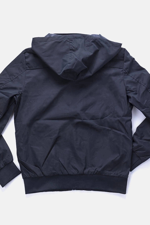 Cazadora cortavientos con capucha...