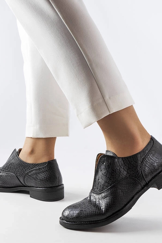 Botas de piel sintética negras de... Botas de piel sintética negras de...