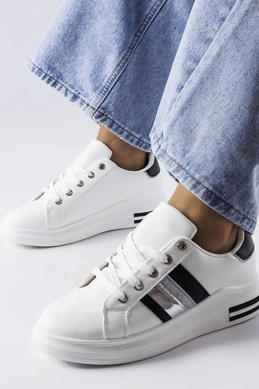 Zapatillas deportivas en blanco y... Zapatillas deportivas en blanco y...