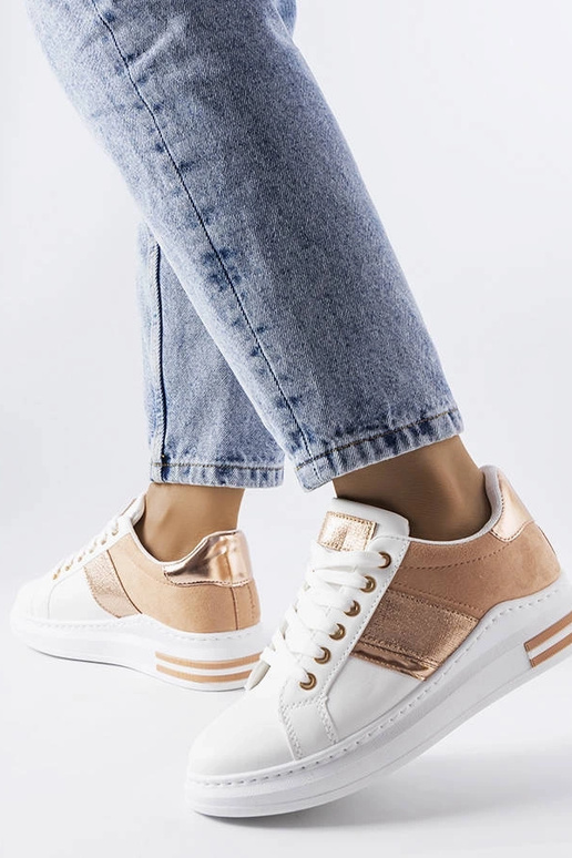 Zapatillas blancas con inserciones...