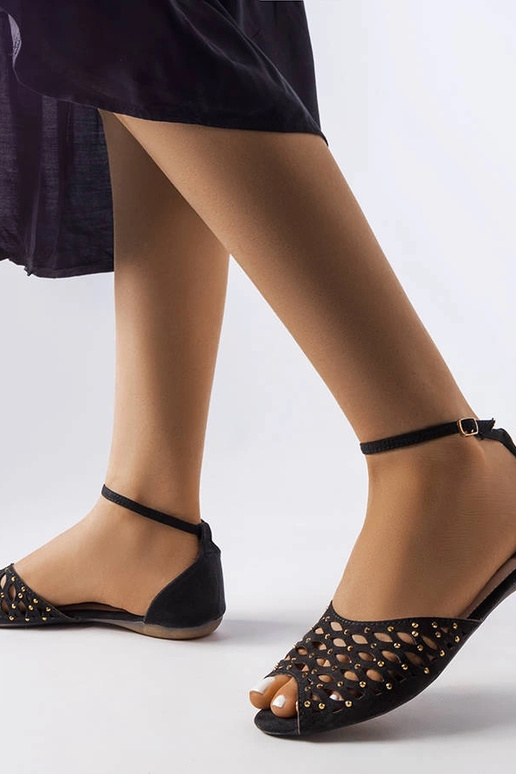 Sandalias negras caladas con...