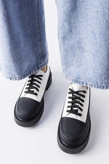 Zapatos planos blancos Merico