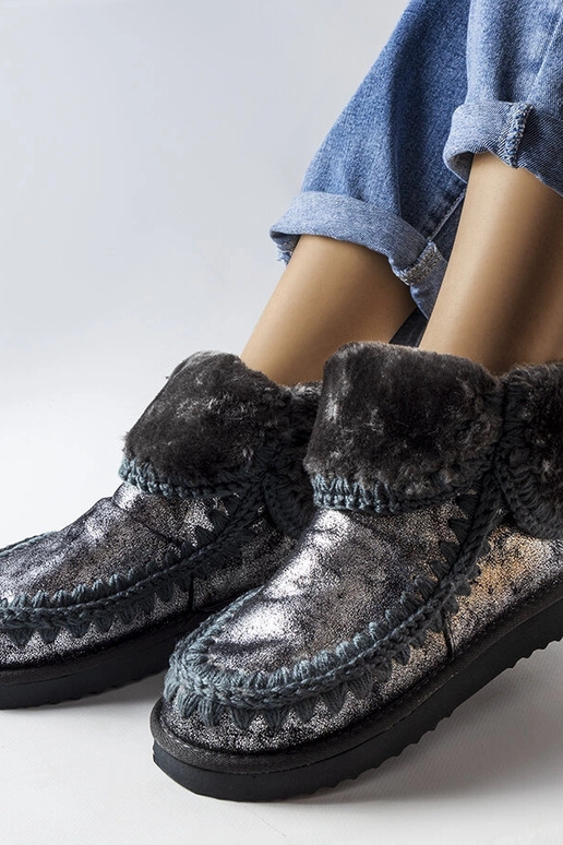 Botas metálicas grises de invierno,...